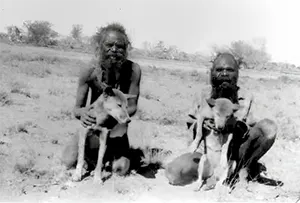 Aboriginals with their pet dingoes