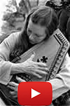 girl playing Waltzing Matilda on a auto harp