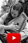 Girl playing an auto harp (zither)